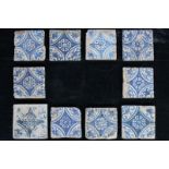 A group of 10 Manises tiles blue and white, 16th C. and one lozenge shaped tile, 17th C. All