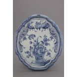 A Dutch Delft floral plaque 18th C. A fine blue and white Dutch Delft plaque with floral decoration,