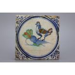 A very rare polychrome Dutch Delft tile with a rooster and a turnip, Haarlem ca. 1620 The unusual