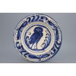 A blue and white Spanish Puente del Arzobispo plate with an owl, 1575-1600 Wonderfully decorated