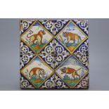 A set of 4 early Dutch maiolica lozenge tiles with animals ca. 1600: One elephant, a cat or tiger, a