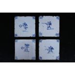 Four Dutch Delft tiles cupids 17th C. A set of four Dutch Delft blue and white tiles with oxhead