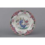 A Chinese porcelain famille rose plate, Yongzheng or Qianlong, 18th C. Condition: Perfect. Dia: 22