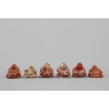 A group of 6 Chinese carved hardstone figures of buddha, 20th C. H: 5,5 cm (the tallest)