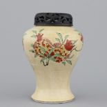 A Chinese porcelain cafe au lait vase with wucai sanduo decoration, Kangxi, ca. 1690 The wooden