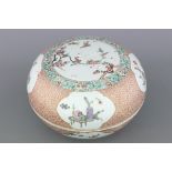 A Chinese porcelain famille rose round box and cover, Qianlong mark and probably of the period