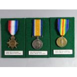 Three WWI medals consisting of a 1914-15 Star to 3248 Pte. R. Roberts, R.W.F., a War Medal to 910