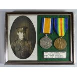 A framed WWI pair of War & Victory Medals to 37787 Pte. Thomas O. Owen, 10th Bn. R.W.F. together