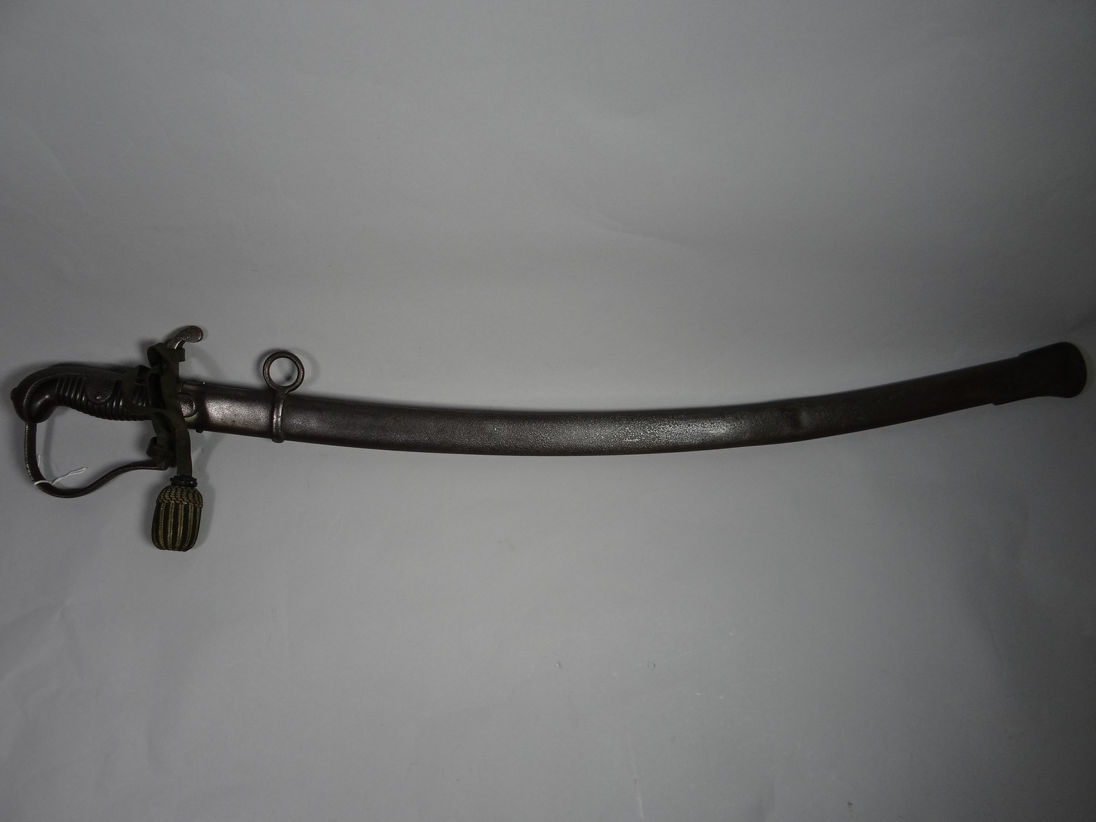 A Prussian heavy cavalry sword in scabbard with portepee knot