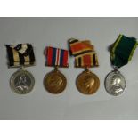 A Territorial Efficiency Medal to 479052 Pte. J.W. Shearing, R.A.M.C., together with two George V