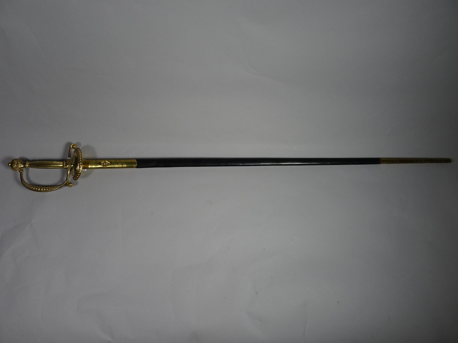 A Diplomatic Service Pattern Court sword by Wilkinson in a leather and brass scabbard