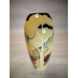 A Moorcroft pottery baluster vase in the 'Eventide Winter' pattern, 7.5 ins high (19 cms)
