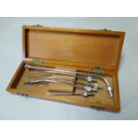 Cased abdominal surgical suction tubes