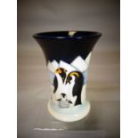 A Moorcroft pottery 'Penguins Family on Ice' flared neck vase, 6 ins high (16 cms)