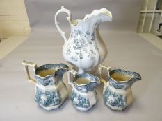 A trio of Staffordshire transfer jugs 'Alhambra' and a larger Staffordshire floral transfer