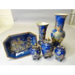 A suite of Carltonware blue ground china with matching lustre decoration and Chinese landscape