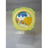 A Clarice Cliff Bizarre tea plate of shaped form and with inner stylised landscape scene, 9 ins