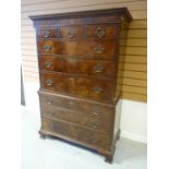 A Waring & Gillow mahogany chest-on-chest, the base having three long graduated drawers, below a top