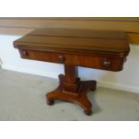 A mahogany fold-over tea-table with column support on a shaped base, 35.5 ins wide (90 cms)