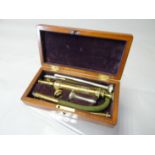 A cased Mawson Thompson brass irrigation set