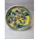 A nineteenth century Chinese polychrome shallow charger dish decorated with Samurai Warriors in