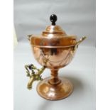 A good arts & crafts copper twin handled samovar with turned knop