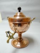 A good arts & crafts copper twin handled samovar with turned knop