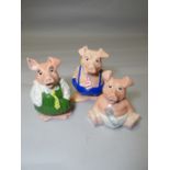 Three Natwest commissioned Wade pottery piggy banks