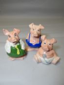 Three Natwest commissioned Wade pottery piggy banks
