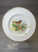 A Royal Worcester cabinet plate painted with a redstart perched upon brambles, signed William