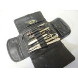 Minor operations kit in leather wallet together with lancet set