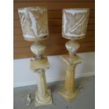 A pair of twentieth century marble floor-standing lamps on square bases with fluted and tapering
