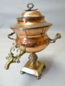 A copper and brass handled twin-handled samovar (damage to lid)