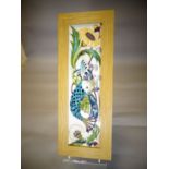 A Moorcroft framed pottery plaque in the 'Fishing for Dreams' pattern, 6 x 16 ins (15 x 41 cms)