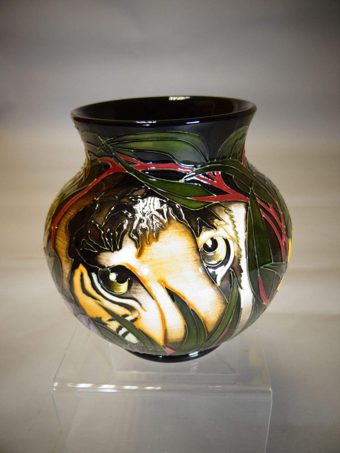 A Moorcroft pottery ovoid vase in the 'Hidden King's Tiger' pattern, 6 ins high (15 cms)