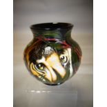 A Moorcroft pottery ovoid vase in the 'Hidden King's Tiger' pattern, 6 ins high (15 cms)
