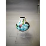 A small Moorcroft 'Sea Holly' ovoid vase, 2.25 ins high (6 cms)