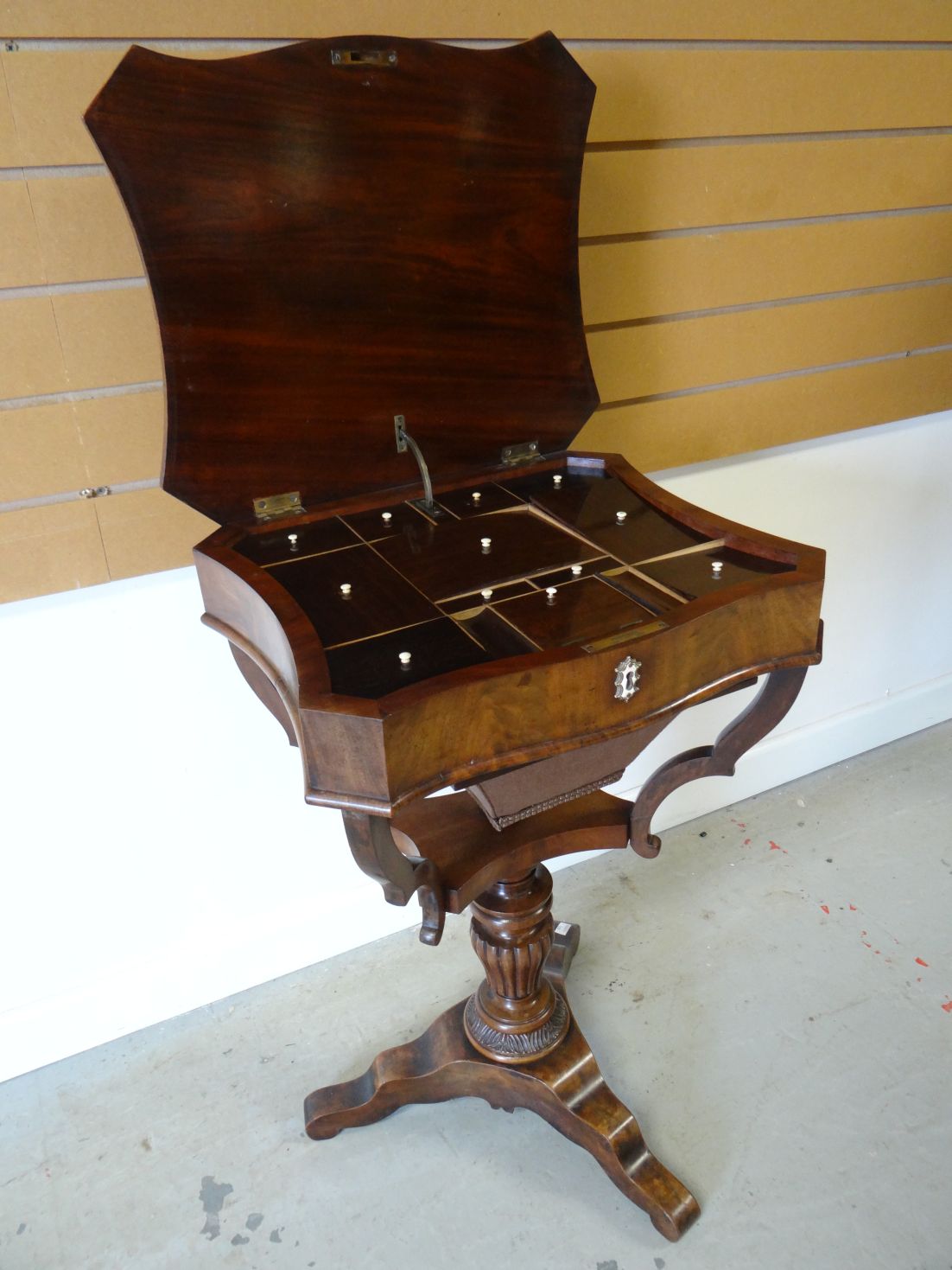 A Victorian mahogany sewing table, raised on a carved tripod-base, the hinged lid revealing an - Image 2 of 2