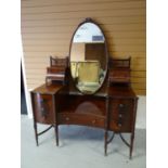 A late nineteenth century mahogany dressing-table by Maple & Co, (to match Lots, 23, 24, 25 & 27)