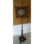 Late-Victorian circular-based rosewood pole-screen on three carved feather feet, and with further