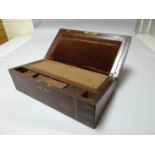 A brass bound rosewood lap desk with fitted interior, 20 ins wide (51 cms)