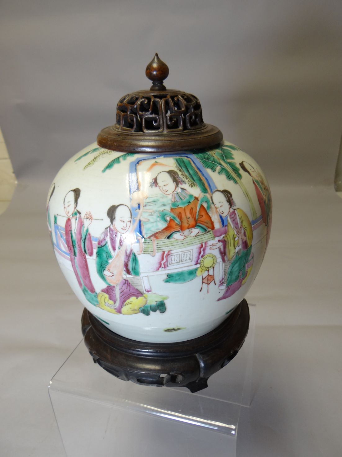 A nineteenth century Chinese white ground ginger jar on stand with wooden fret-work cover (jar