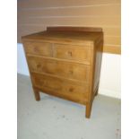 A small light oak Brynmawr Furniture chest of two long and two short drawers bearing Brynmawr label,