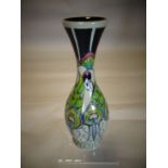 A Moorcroft pottery waisted vase in the 'Peacock Parade' pattern, 10 ins high (26 cms)