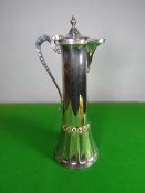 An Art Nouveau EPNS claret jug having a hinged spouted lid, swan-neck handle, and with fluted and