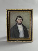 A miniature portrait on believed ivory - finely dressed Georgian gentleman, 10 x 7.5 cms