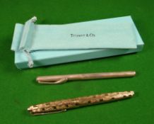 A Tiffany & Co Sterling Silver pen (with box and bag); together with a Parker yellow metal