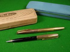 A cased Waterman fountain-pen with 18k nib and yellow metal barrel; together with a rolled gold