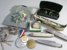 An interesting mixture of items including amber snuff-scoop, three pen-knives, old spectacles,