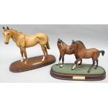 A Royal Doulton horse standing sculpture 'Mr Frisk' in matt finish and on an oval wooden plinth;
